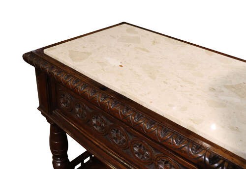 A French Henri II style dark oak enfilade with a carved frieze drawer, turned column supports, and an open lower shelf framed by a spindle rail. View VI
