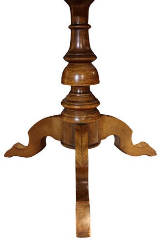 A circular walnut occasional table featuring intricate geometric parquetry and marquetry inlay on a turned central pedestal with three splayed legs. View III