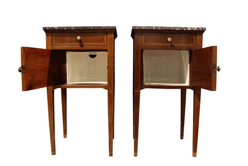 Pair of tall, slender mahogany bedside cupboards with satinwood oval inlay, dark marble tops, single drawers, and square tapered legs. View IV