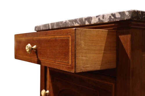 Pair of tall, slender mahogany bedside cupboards with satinwood oval inlay, dark marble tops, single drawers, and square tapered legs. View IX