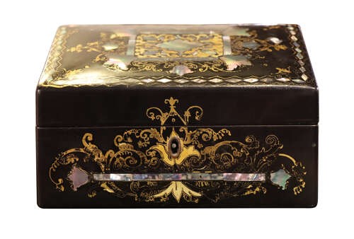 A black lacquered Victorian sloped stationery box adorned with gold leaf scrollwork and mother-of-pearl inlay. View III