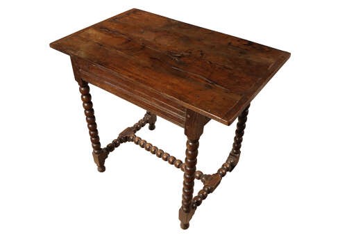 An early 18th-century dark oak side table featuring four bobbin-turned legs connected by matching lower stretchers and a rectangular wooden top. View V