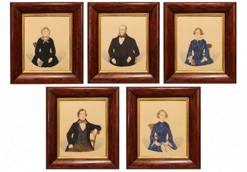 A set of five framed Regency period watercolour portraits depicting seated men and women in dark attire, mounted within wide rosewood frames with gilt inner slips.