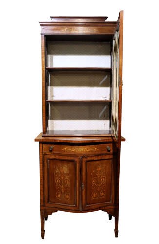 An Edwardian inlaid mahogany display cabinet featuring a glazed top door with geometric tracery above a lower cupboard with floral marquetry. View II