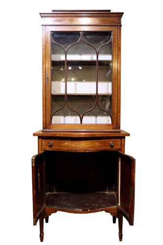 An Edwardian inlaid mahogany display cabinet featuring a glazed top door with geometric tracery above a lower cupboard with floral marquetry. View III