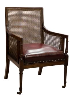 19THC MAHOGANY BERGERE LIBRARY ARM CHAIR