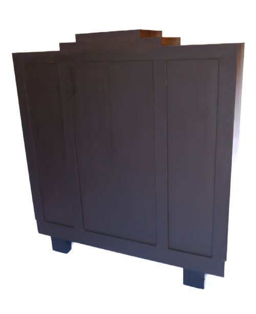 fig 1. A 1930s Art Deco walnut display cabinet featuring a central glazed door with glass shelves, flanked by two veneered wooden cupboard doors and supported by ebonised feet.