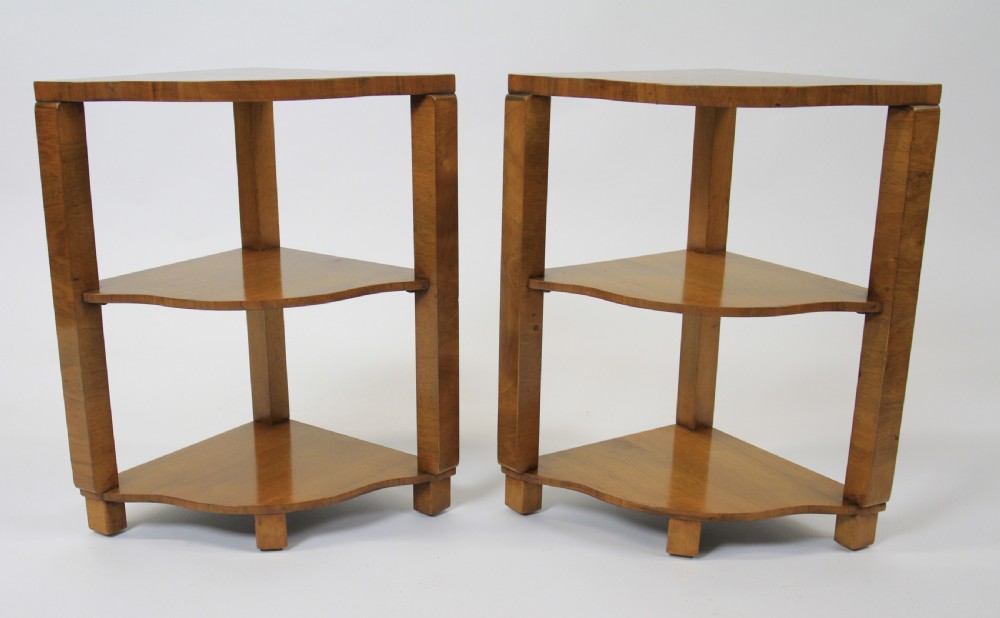 An Art Deco burr walnut nest of tables featuring a cloud-shaped top and four fitted segment side tables underneath. View VI