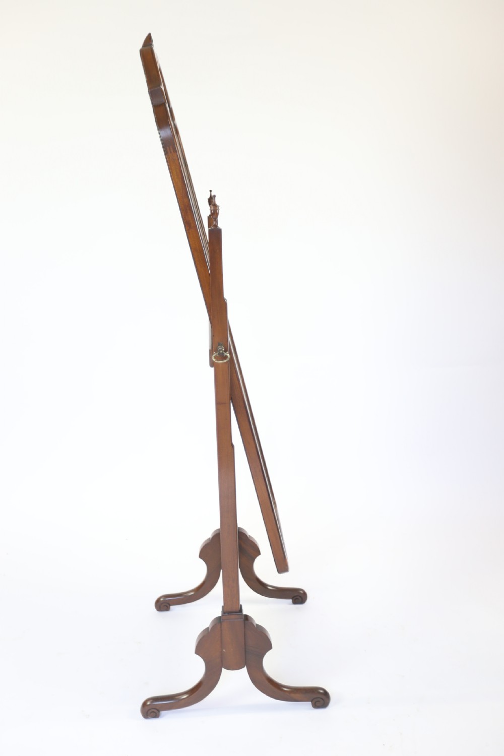 A full-length walnut cheval mirror featuring an arched frame with a carved shell motif crest, turned side support posts, and splayed legs. View II