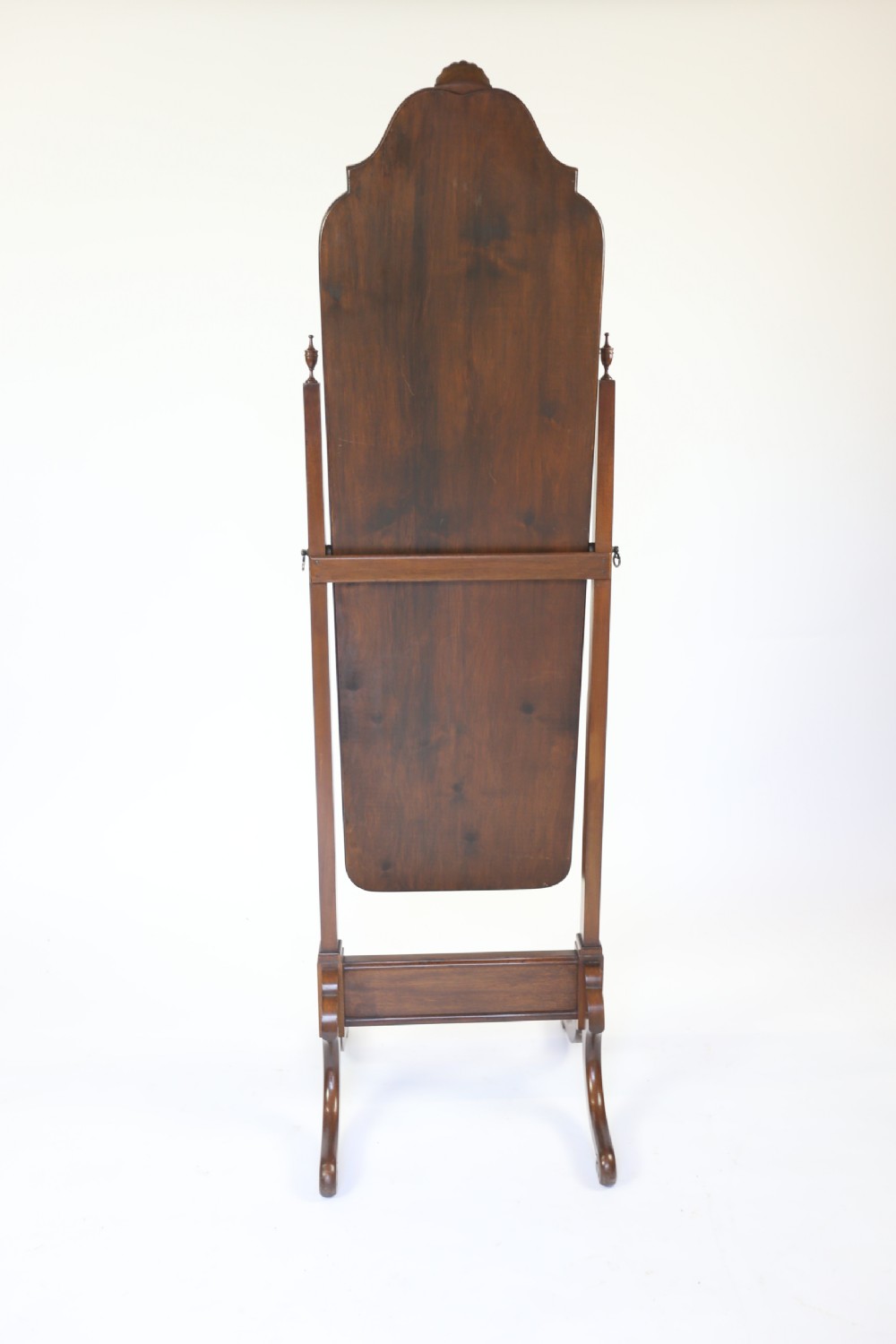 A full-length walnut cheval mirror featuring an arched frame with a carved shell motif crest, turned side support posts, and splayed legs. View III