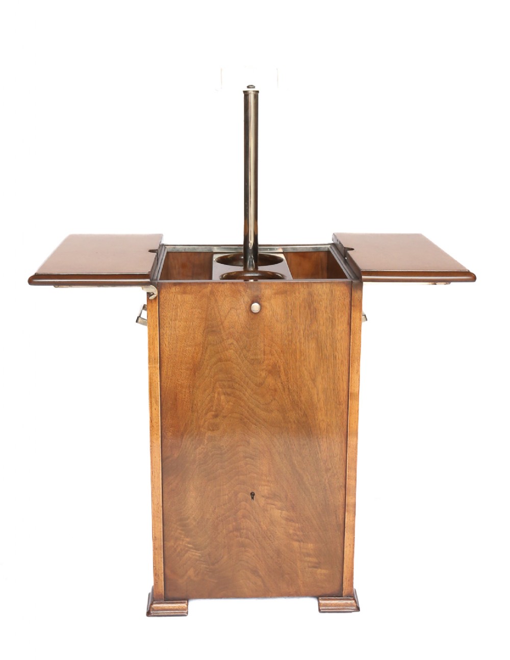 An Art Deco walnut elevette drinks cabinet with opened top leaves revealing a rising central metal pillar mechanism.