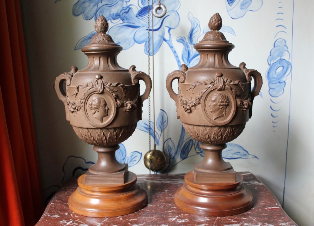 Pair of French terracotta portrait urns