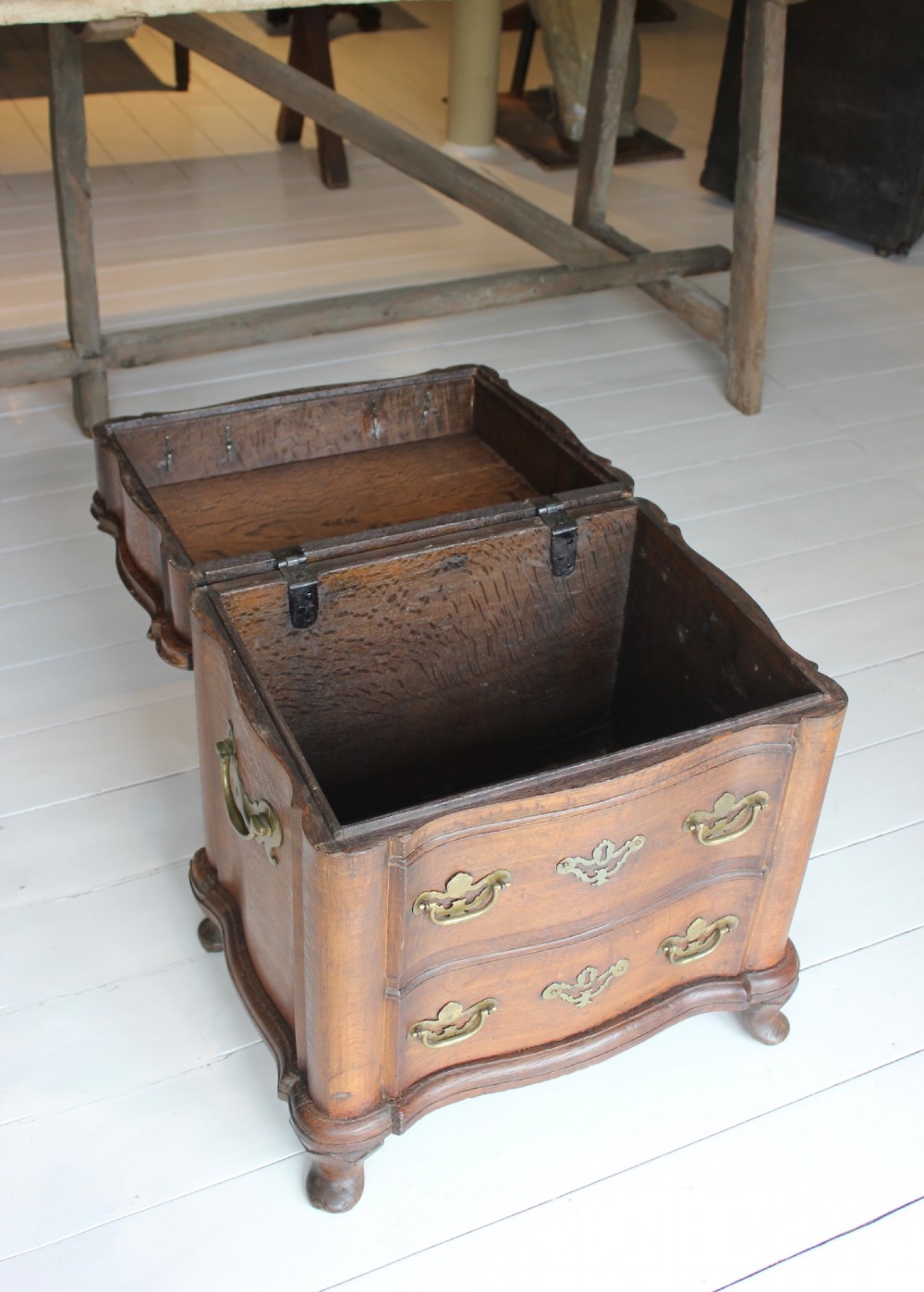 An 18th-century wooden close stool featuring false drawer fronts, brass drop handles, side carrying handles, and short turned feet. View IV