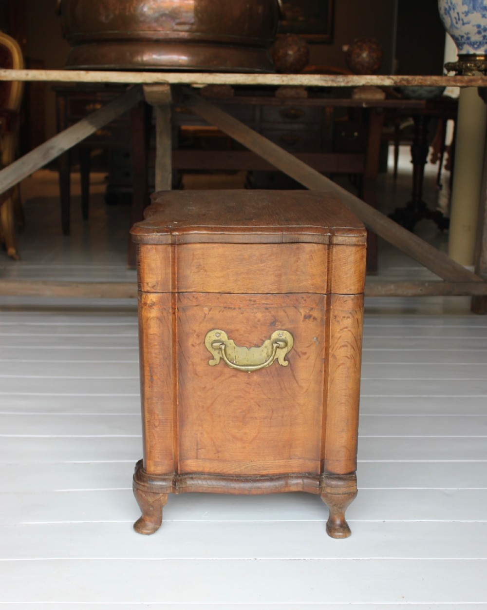 An 18th-century wooden close stool featuring false drawer fronts, brass drop handles, side carrying handles, and short turned feet. View VIII