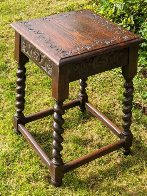 A Carved Oak Stand