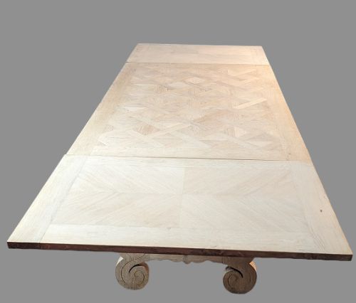 A Bleached Solid Oak Draw Leaf Table