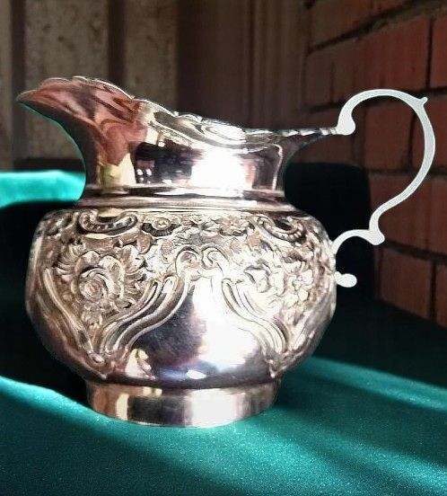 An Edwardian Solid Silver Cream Jug