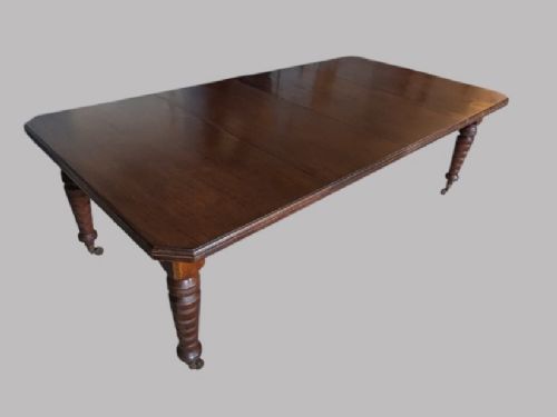 A Late Victorian Walnut Extending Dining Table