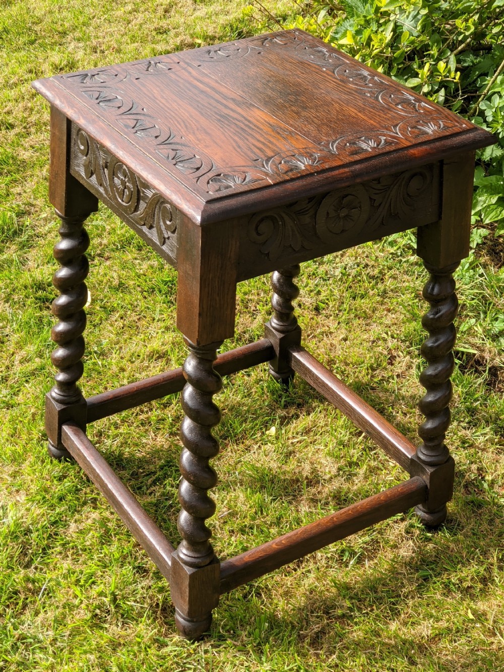 A Carved Oak stand