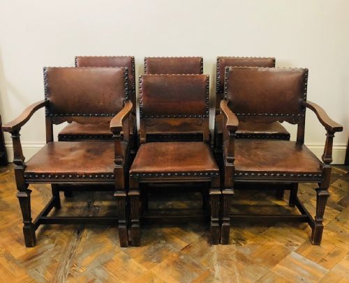 

Set of Six Brown Leather Chairs Inc. Two Armchairs
