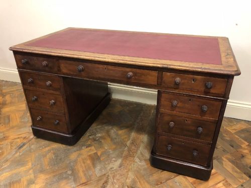 fig 1. 19th Century Twin Pedestal Kneehole Desk with Red Leather Top