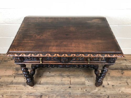 fig 2. Heavily Carved 19th Century Oak Two Drawer Table