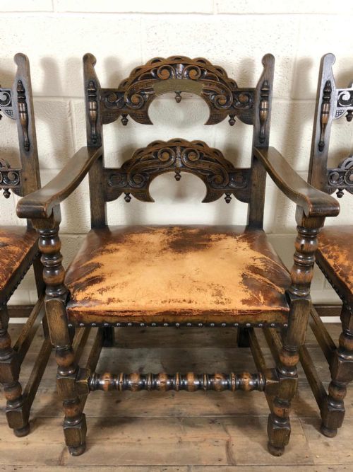fig 1. Carved Oak Armchair with Leather Seat