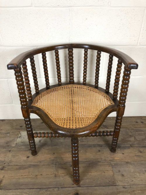 fig 1. Bobbin Turned Corner Chair with Cane Seat
