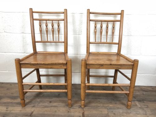 Pair of Light Coloured Comb Back Chairs