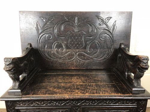 fig 1. Heavily Carved Antique Oak Monk’s Bench with Under Seat Storage