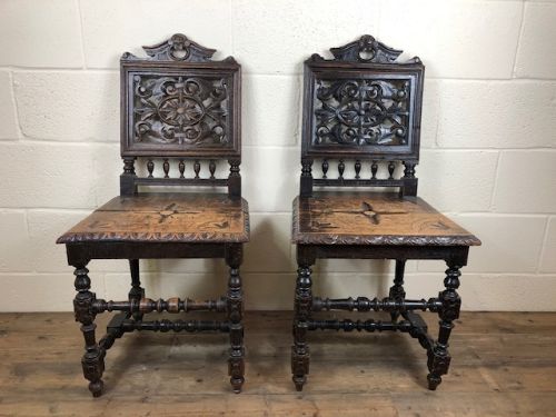Pair of Decorative Carved Oak Hall Chairs