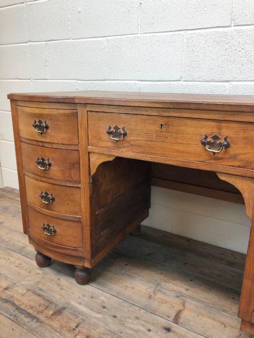 fig 1. Antique Bow Front Pedestal Kneehole Desk