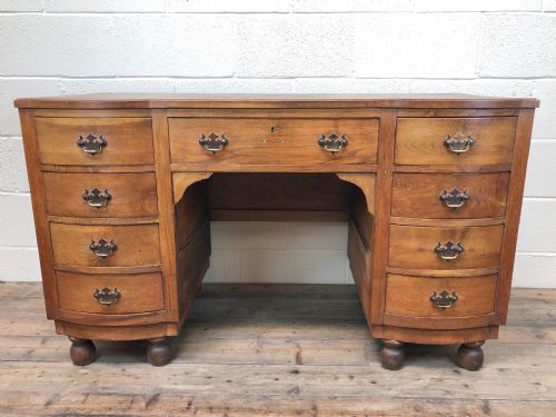 Antique Bow Front Pedestal Kneehole Desk
