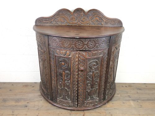 fig 1. Antique 19th Century Carved Demi Lune Cupboard