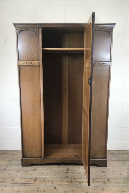 fig 1. Early 20th Century Oak Linen Fold Wardrobe – By L. Marcus Ltd.