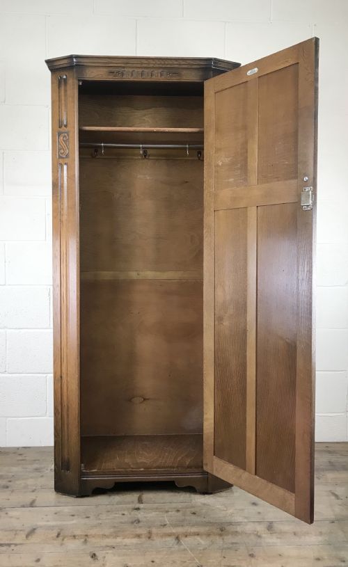 fig 2. Early 20th Century Oak Linen Fold Hall Cupboard – By L. Marcus Ltd.