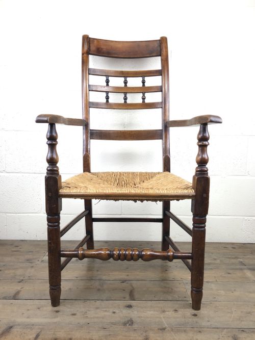 fig 1. Antique Elm Spindle Back Armchair with Rush Seat