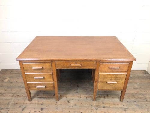 fig 1. Early 20th Century Oak Desk with Six Drawers