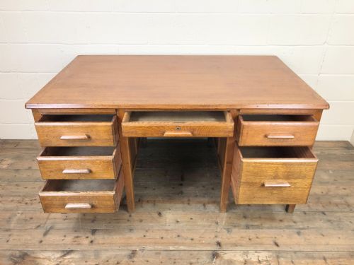 fig 2. Early 20th Century Oak Desk with Six Drawers
