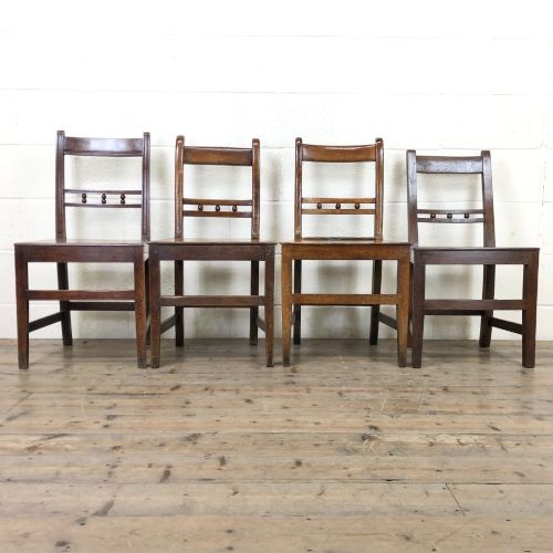 Harlequin Set of 19th Century Welsh Oak Ball and Rail Back Chairs