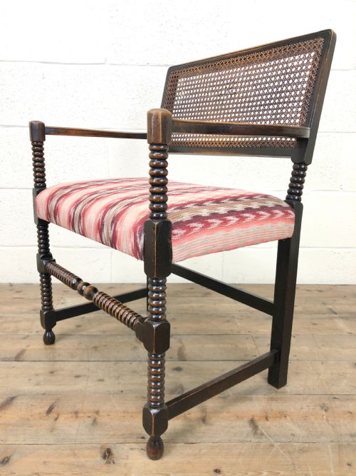 fig 1. Antique Upholstered Rattan Chair