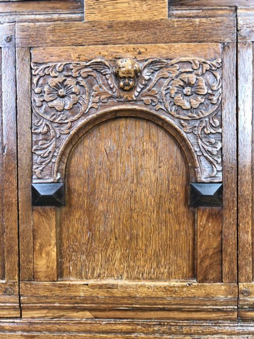 fig 2. Antique Oak Cupboard with Carved Detail