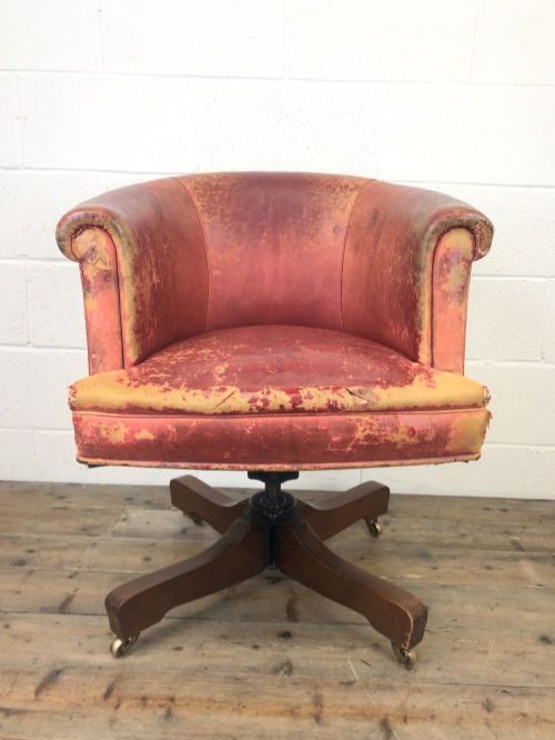 fig 1. Antique Distressed Leather Swivel Armchair