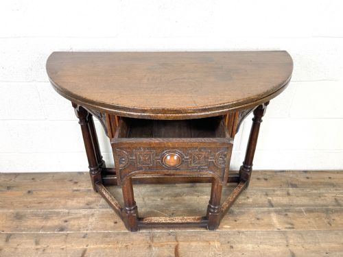 fig 2. Carved Oak Fold-over Demi Lune Table