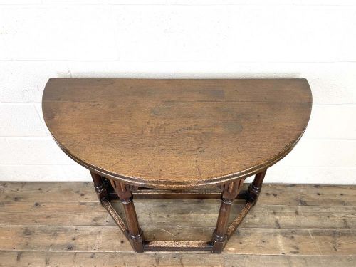 fig 2. ANTIQUE CARVED OAK FOLD-OVER DEMI LUNE TABLE