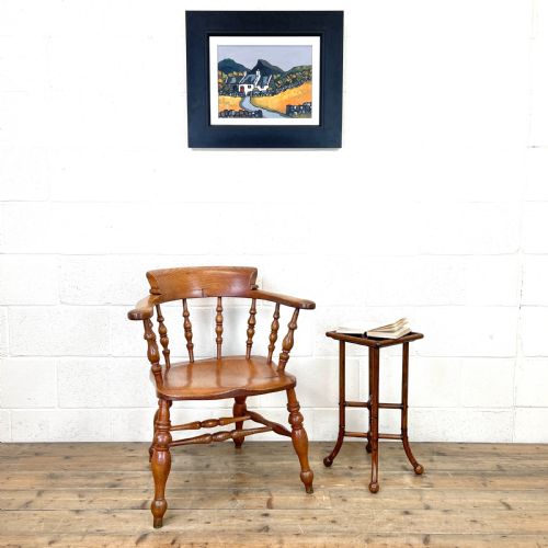 fig 1. Antique Elm Captain's Chair