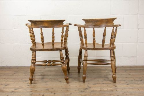fig 2. Two Similar Antique Elm Captain’s Chairs