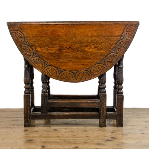 fig 1. Antique Carved Oak Gateleg Table