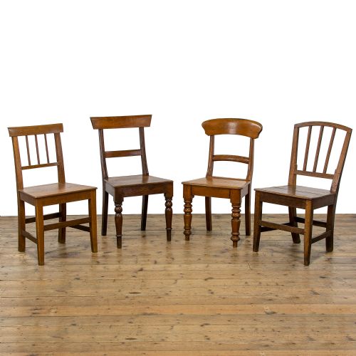 Harlequin Set of Four Antique Oak Farmhouse Chairs