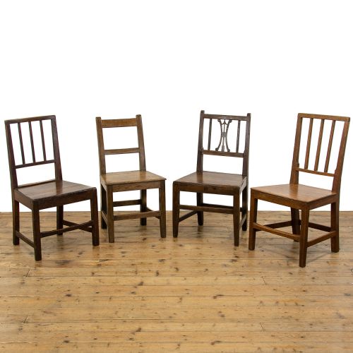 Harlequin Set of Four Antique Welsh Oak Farmhouse Chairs